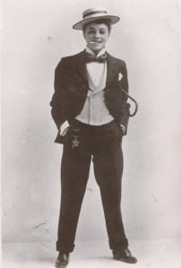 Boater, waistcoat and cigar